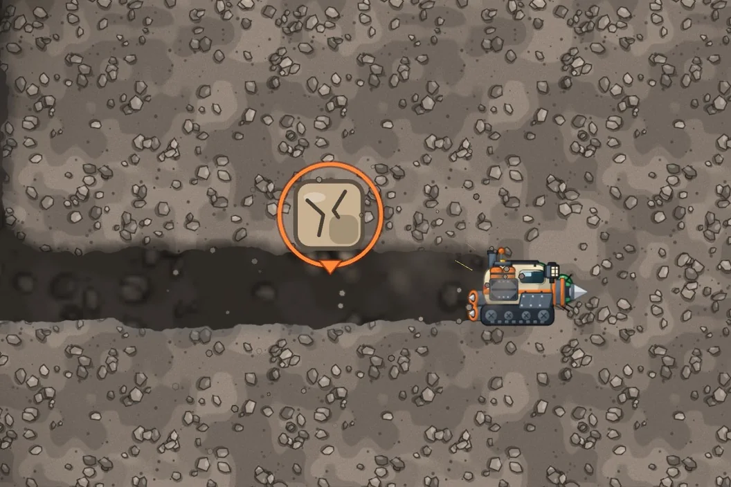 A round warning marker with a cracked rock hangs over the tunnel in front of the drill ship