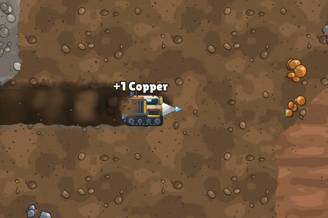 A drill ship tunnels through brown topsoil and picks up copper ore